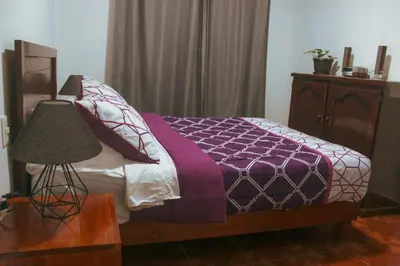Cama o camas de una habitación en Departamentos 