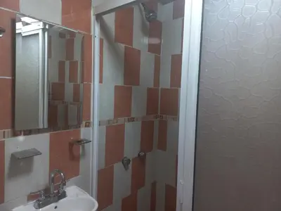 Un baño de Agradable y cómodo departamento a 5 minutos del aeropuerto