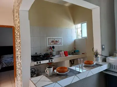 Una cocina o zona de cocina en Nice apartamento. 5 minutos del aeropuerto.