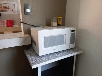 Una cocina o zona de cocina en Nice apartamento. 5 minutos del aeropuerto.