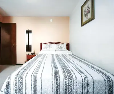 Cama o camas de una habitación en Cozy bedroom at 5 min Mexico City Airport T1 & T2