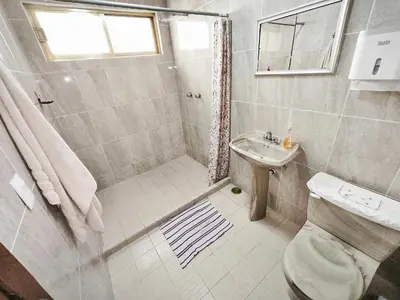 Un baño de Cozy bedroom at 5 min Mexico City Airport T1 & T2