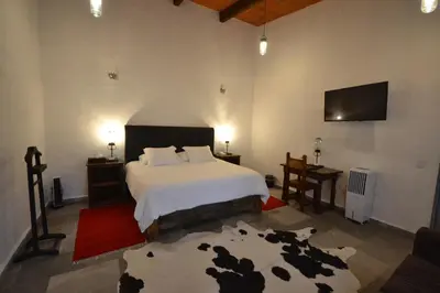 Cama o camas de una habitación en Rústika SPA Hotel Boutique