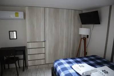 Cama o camas de una habitación en Grand Depa Bellomar
