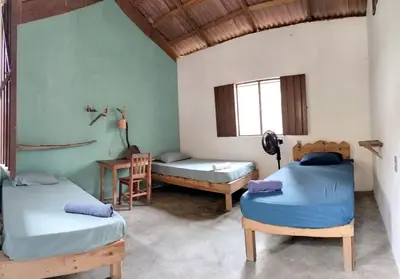 Cama o camas de una habitación en Cabañas La Escondida Mazunte
