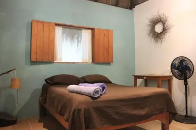 Cama o camas de una habitación en Cabañas La Escondida Mazunte