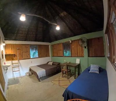 Cama o camas de una habitación en Cabañas La Escondida Mazunte
