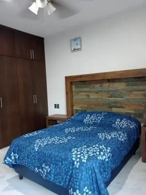Cama o camas de una habitación en Hermosa Residencia junto al mar