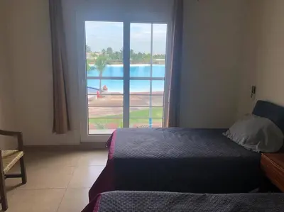 Cama o camas de una habitación en Departamento, Laguna y Albercas en Dream Lagoons Veracruz