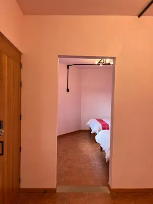 Cama o camas de una habitación en Suites Patio Antequera