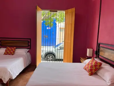 Cama o camas de una habitación en Suites Patio Antequera