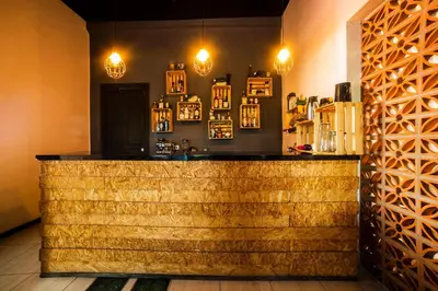 El salón o zona de bar de Collection O Al otro lado del rio, Puebla