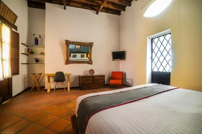 Cama o camas de una habitación en Collection O Al otro lado del rio, Puebla