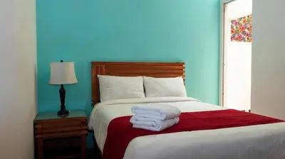 Cama o camas de una habitación en Hotel Integra Tepoztlán