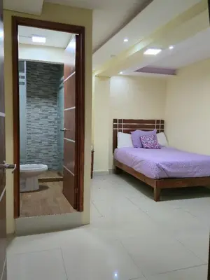 Cama o camas de una habitación en HOTEL PUEBLO BONITO