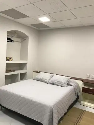 Cama o camas de una habitación en Hermosa Hacienda Las Heliconias