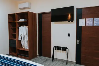 Una televisión o centro de entretenimiento en Hotel Casa Puga