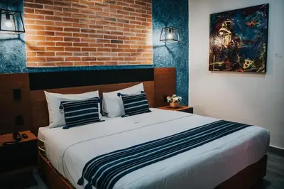 Cama o camas de una habitación en Hotel Casa Puga