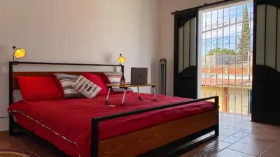 Cama o camas de una habitación en Pent house con terraza o departamento con balcón en el centro de oaxaca
