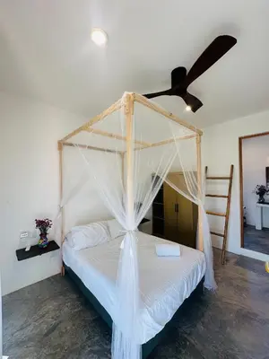 Cama o camas de una habitación en Private Beach House in AguaBlanca Peaceful Getaway