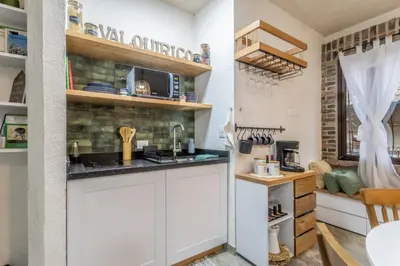 Una cocina o zona de cocina en Cipressi Lofts Val'Quirico