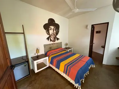 Cama o camas de una habitación en One Love Hostal Puerto Escondido