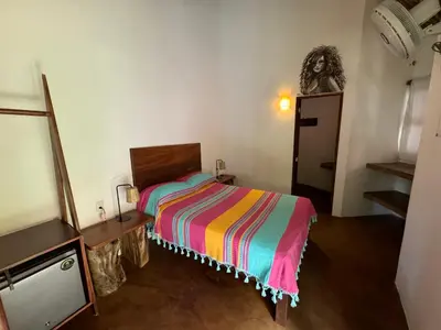 Cama o camas de una habitación en One Love Hostal Puerto Escondido