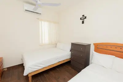 Cama o camas de una habitación en Casa Blanca