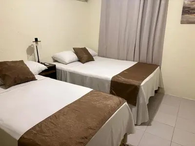 Cama o camas de una habitación en Casa Leon Rinconada