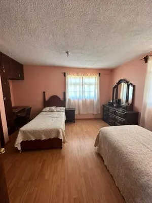 Cama o camas de una habitación en Vive en un rancho