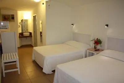 Cama o camas de una habitación en Hotel Olinalá Diamante