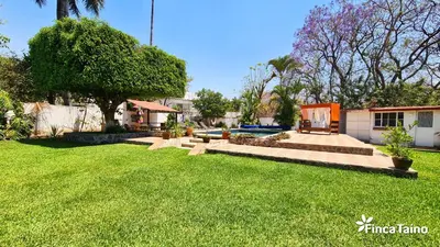 Jardín al aire libre en Finca Taino. Hermosa casa con alberca