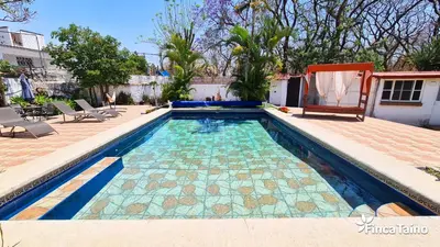 Piscina en o cerca de Finca Taino. Hermosa casa con alberca