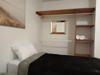 Cama o camas de una habitación en Hospedaje 