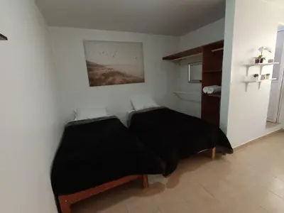 Cama o camas de una habitación en Hospedaje 