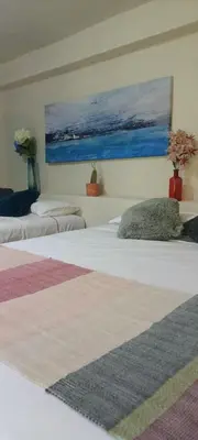 Cama o camas de una habitación en Mar de Fondo