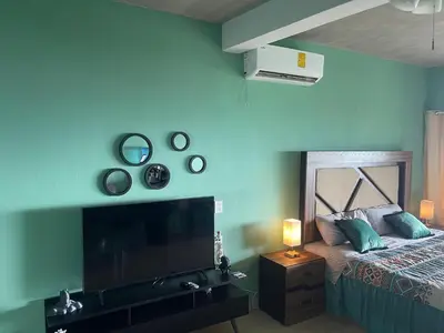 Una televisión o centro de entretenimiento en Brisa del Mar #6