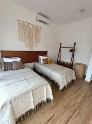 Cama o camas de una habitación en Casa Tres Iguanas, La Punta
