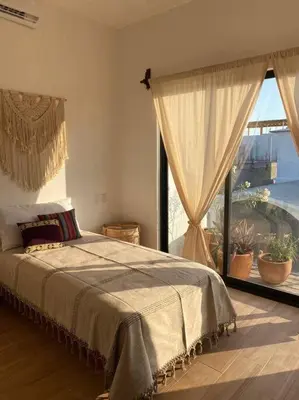 Cama o camas de una habitación en Casa Tres Iguanas, La Punta