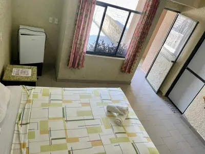 Cama o camas de una habitación en Hotel Bigu