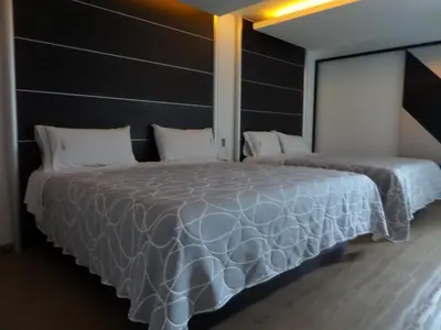 Cama o camas de una habitación en Novo Coapa