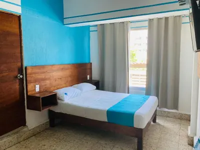 Cama o camas de una habitación en Hotel Lu Acapulco