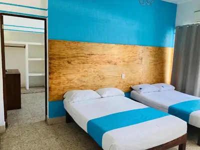 Cama o camas de una habitación en Hotel Lu Acapulco