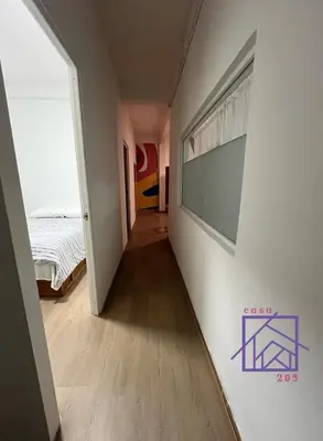 Una televisión o centro de entretenimiento en Casa 205