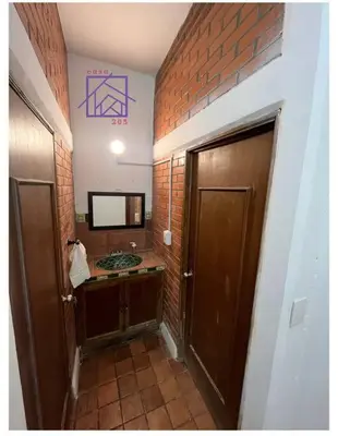 Una televisión o centro de entretenimiento en Casa 205