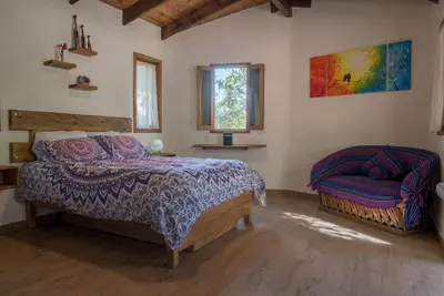 Cama o camas de una habitación en Bungalow Indra Tepoztlan