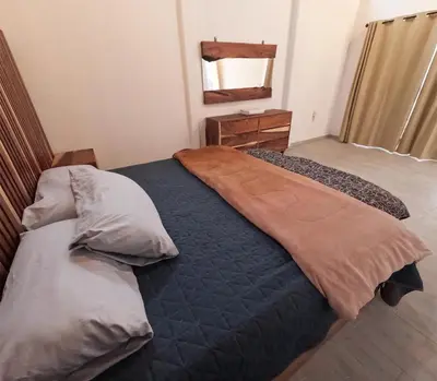 Cama o camas de una habitación en Residencial Aéreo Albatros