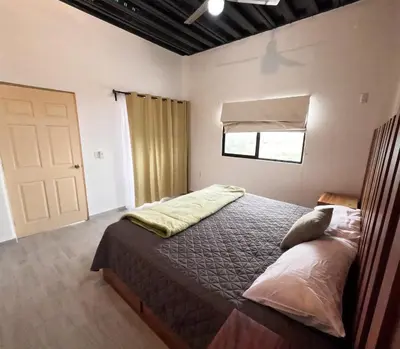 Cama o camas de una habitación en Residencial Aéreo Albatros