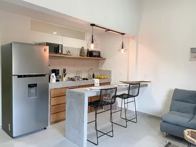 Una cocina o zona de cocina en Rooms Huatulco