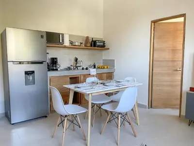 Una cocina o zona de cocina en Rooms Huatulco